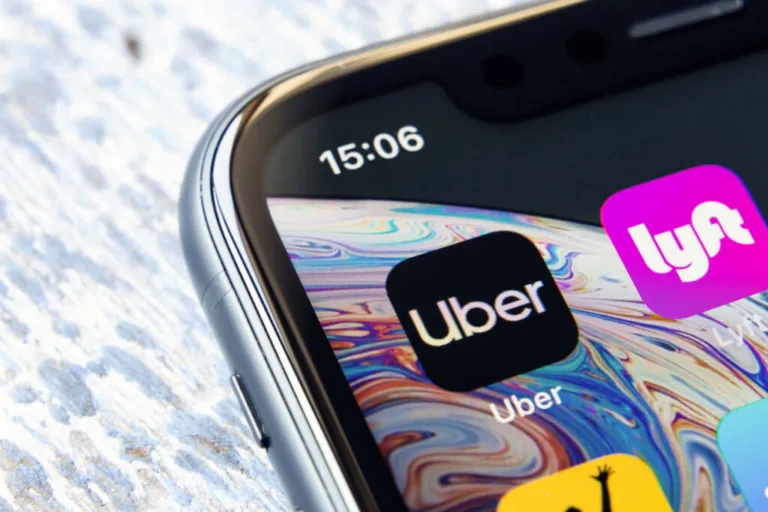 uber and lyft apps on a phone screen