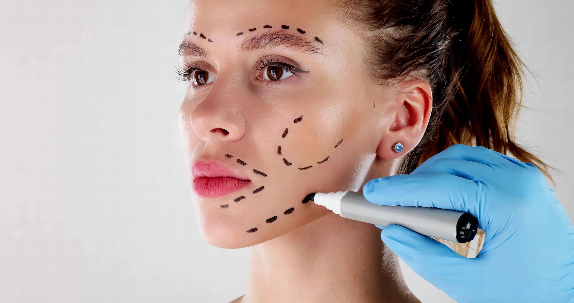 Plastic Surgery Drawings On Woman's Face