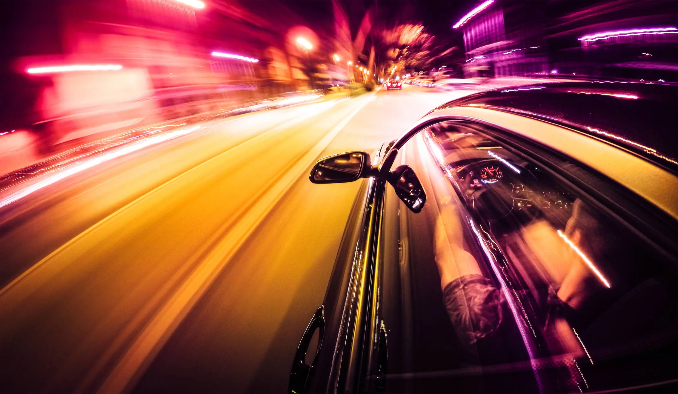 speeding car through city with motion blur