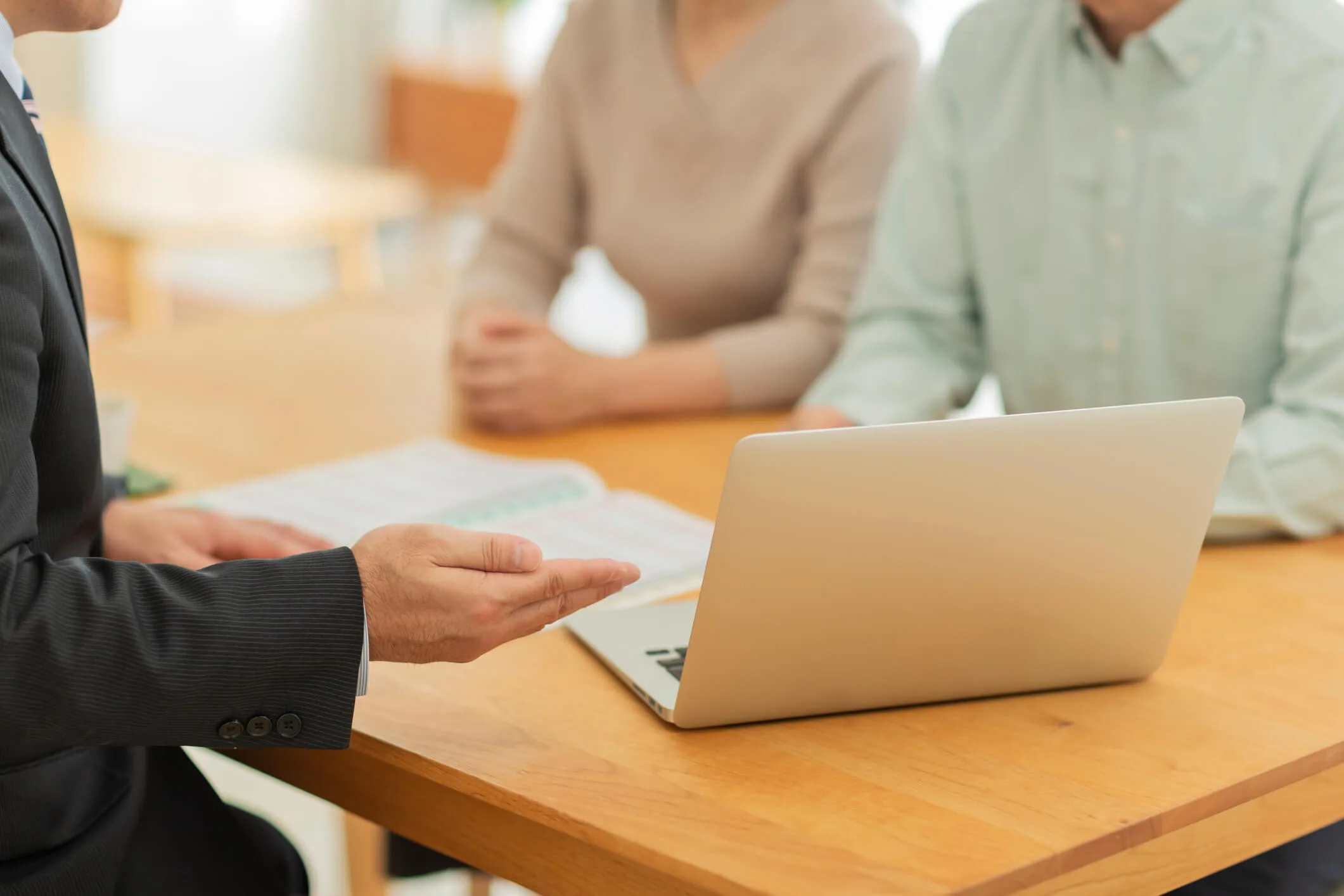 Lawyer meeting with clients in their home